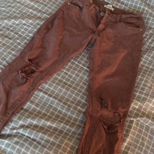 Maroon ripped jeans